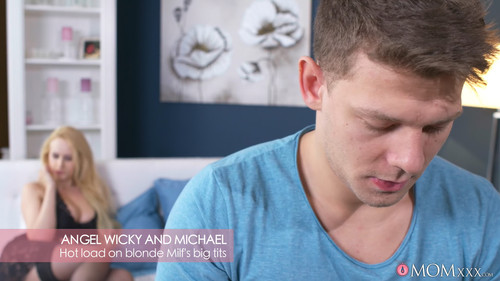 Hot load on blonde MILFs big tits.jpg
