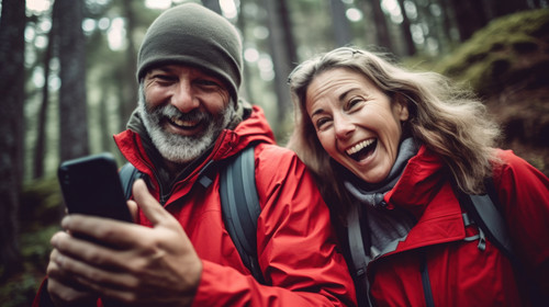 Phone hiking and happy senior people in nature with network social media or video streaming in fores.jpg