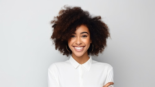 Pointing portrait and black woman with a smile promotion and presentation against a white studio bac.jpg