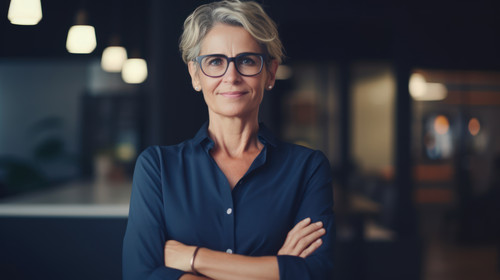 Portrait arms crossed and smile of business woman in office with pride for career and job Ceo glasse.jpg