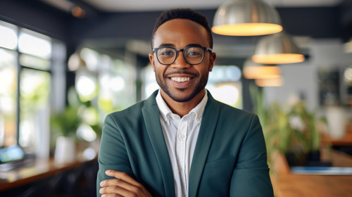 Portrait black man and business writer in office with pride for career or company job Face smile and.jpg