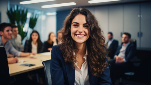 Portrait happy and a business woman in the boardroom with her team during a meeting for planning Smi.jpg