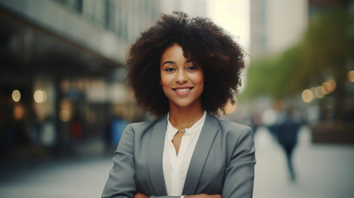 Portrait happy and city with a business black woman standing arms crossed outdoor for management Lea.jpg
