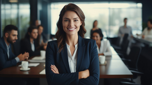 Portrait happy and a business woman in the boardroom with her team during a meeting for planning Smi.jpg