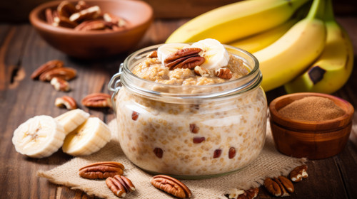 Healthy overnight oatmeal Bircher muesli served with bananas brown sugar pecan nuts and maple syrup .jpg