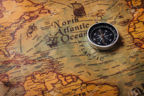 155923066 old compass discovery on vintage paper antique world map background retro style cartograph.jpg