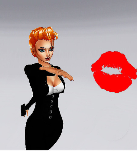 Ember blowing large kiss.jpg