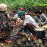 Dumagat%2527s+are+preparing+food+using+traditional+method+using+fire+from+dried+wood