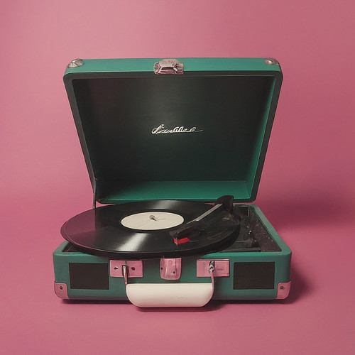image fx retro record player with pink background.jpg