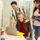 Glass walls. Delighted international female keeping smile on her face while controlling test paper