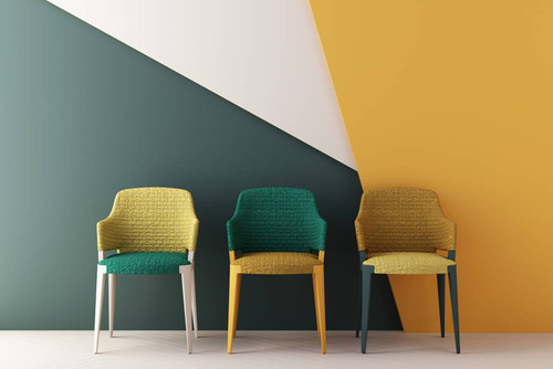yellow and green color chairs, sofa, armchair in empty background. surrounding by geometric shape Co.jpg