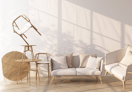 Sofa surrounding by wooden chair and armchair on wooden floor and white wall with sunlight shade fro.jpg