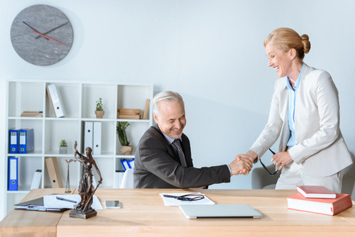 stock photo lawyers shaking hands.jpg