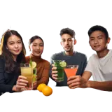 group of friends sitting around a table at a bar, having fun and having cocktails on a bla