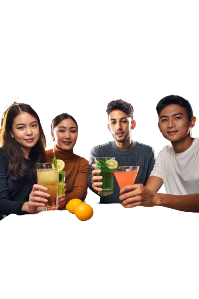 group of friends sitting around a table at a bar, having fun and having cocktails on a bla.webp