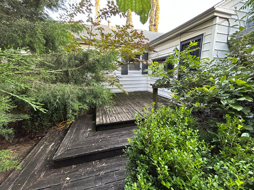30 Porch off Back Door Living Room.jpg