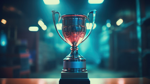 Winner trophy at studio illuminated by neon lights with blurred background Postproducted minimalisti.jpg