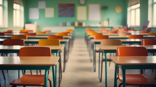 Empty school classroom without young student Blurry view of elementary class room no kid or teacher .jpg