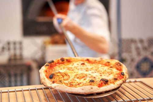 stock photo baked tasty margherita pizza in traditional wood oven in neapolitan restaurant italy ori.jpg