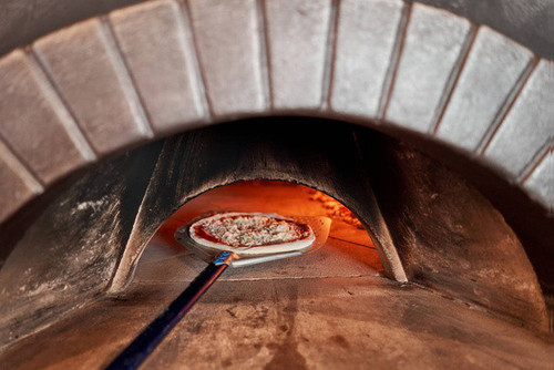 stock photo baked tasty margherita pizza in traditional wood oven in naples restaurant italy origina.jpg