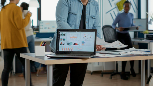 closeup laptop screen with enterprise resource planning showing moving charts growing turnover busy .jpg