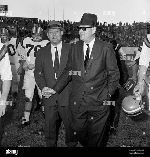 coach abe martin of the texas christian university team is shown dec 19 1959 in houston shaking hand.jpg