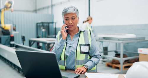 engineer laptop phone call robotics factory manufacturing schedule planning project management matur.jpg