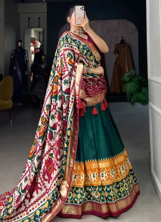 green tussar silk lehenga choli with patola print work for women 282931 0 320x440.webp