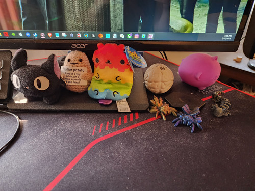 Jiji Plush on Desk Two Closer Look.jpg