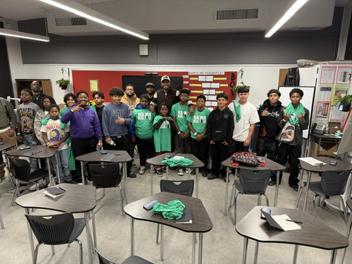 Men's Village Circle group photo outdoors