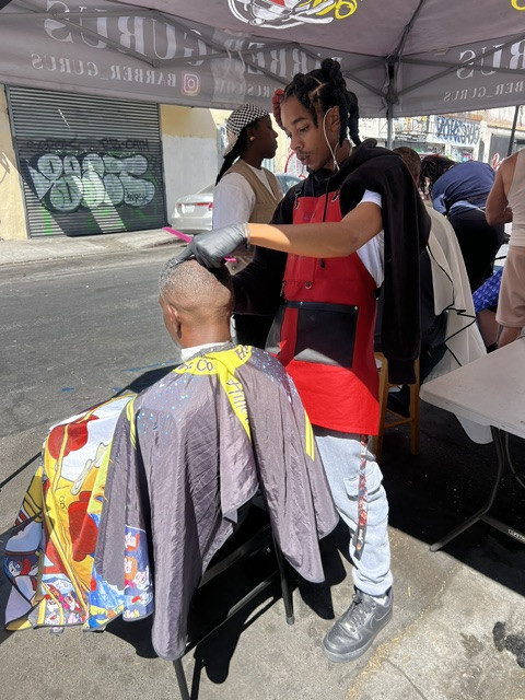 Volunteer providing resources at a table