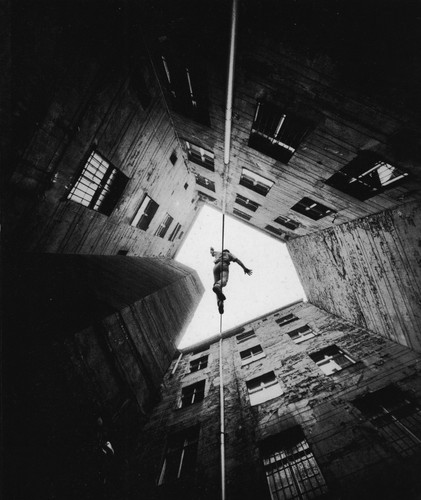 MAN ON A TIGHTROPE IN BERLIN KREUZBERG, LATE 1970s/ EARLY 1980s.jpg