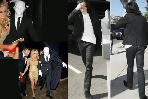Pamela Anderson appeared at a 2008 London fashion show alongside a mysterious masked companion.webp
