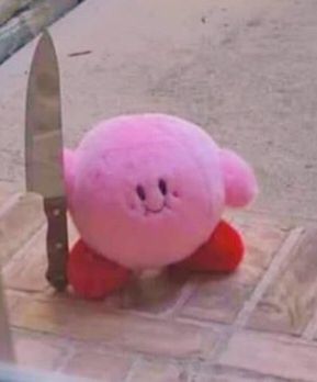 plushie holding a knife meme image
