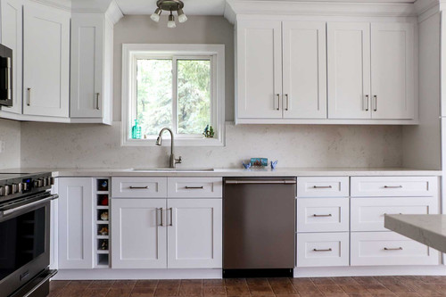 Canada Kitchens shaker white kitchen sink area with window.jpg