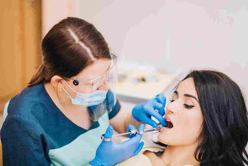 dentist making anesthetic injection patient 11zon.jpg