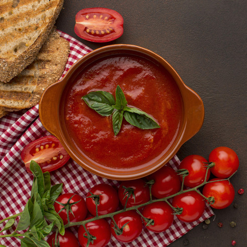 top view winter tomato soup bowl with toast tablecloth.jpg