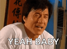 licking lips jackie chan.gif