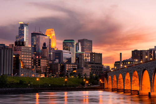 Minneapolis Minnesota Downtown and the Stone Arch Bridge at Sunset.jpg