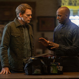 L-R: Michael C. Hall as Dexter Morgan and Ntare Guma Mbaho Mwine as Blessing Kamara in Dexter: Resur