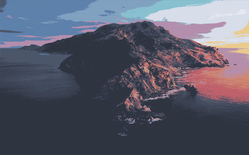 a large mountain with a body of water.jpg