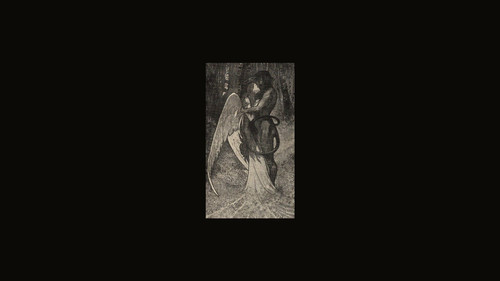 a black and white picture of a man holding a devil.jpg