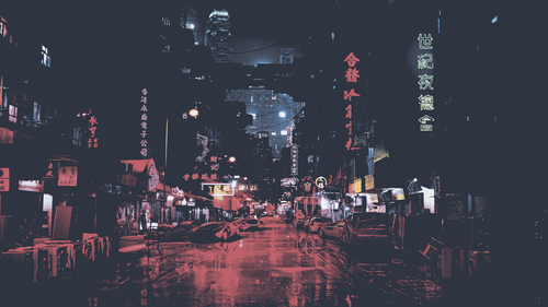 a street with buildings and signs.png