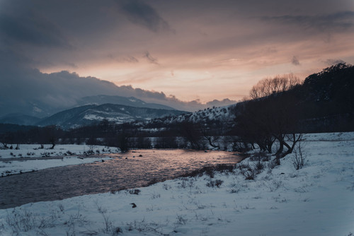 a river in a snowy landscape.jpg
