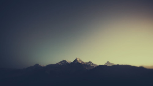 a mountain range with snow on top.jpg