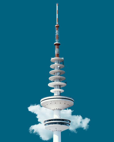 a white tower with a blue sky.jpg