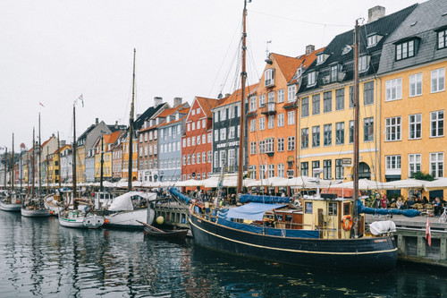 boats in a harbor with buildings in the background.jpg