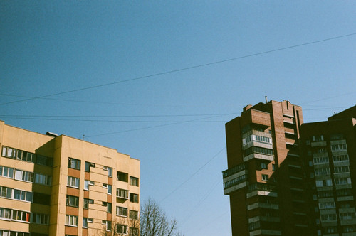 a tall buildings with power lines in the sky.jpg