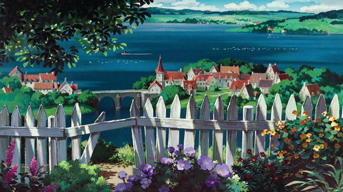 a white picket fence with flowers and a bridge over water.jpg