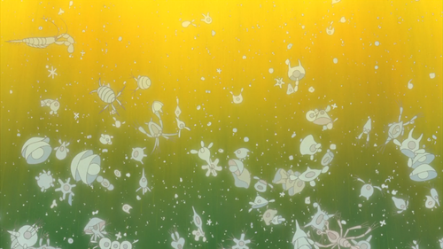 a yellow and green background with many small white objects.png